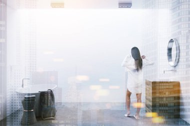 Beyaz duvarlar, beton zemin, beyaz bir küvet ve ahşap lavabo ile minimalist banyo iç. Yuvarlak bir ayna. Bir kadın. 3D render sahte kadar çift tonlu görüntü pozlaması