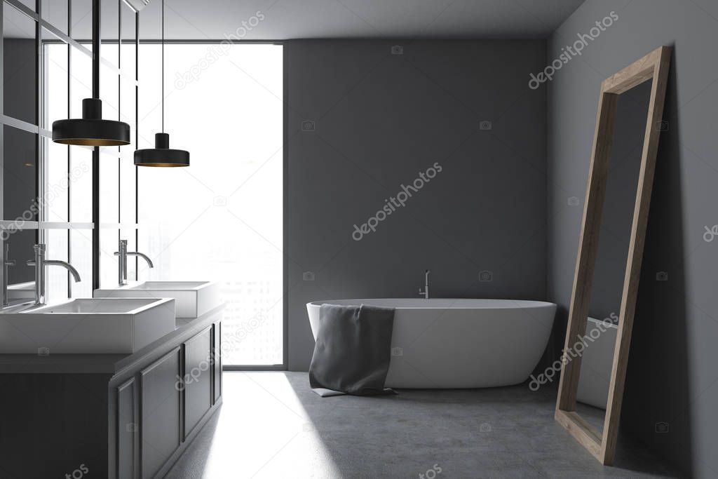 Gray wall bathroom interior with a metal decoration details, a concrete floor and a white tub with a mirror standing near it. A double sink. Side view. 3d rendering mock up