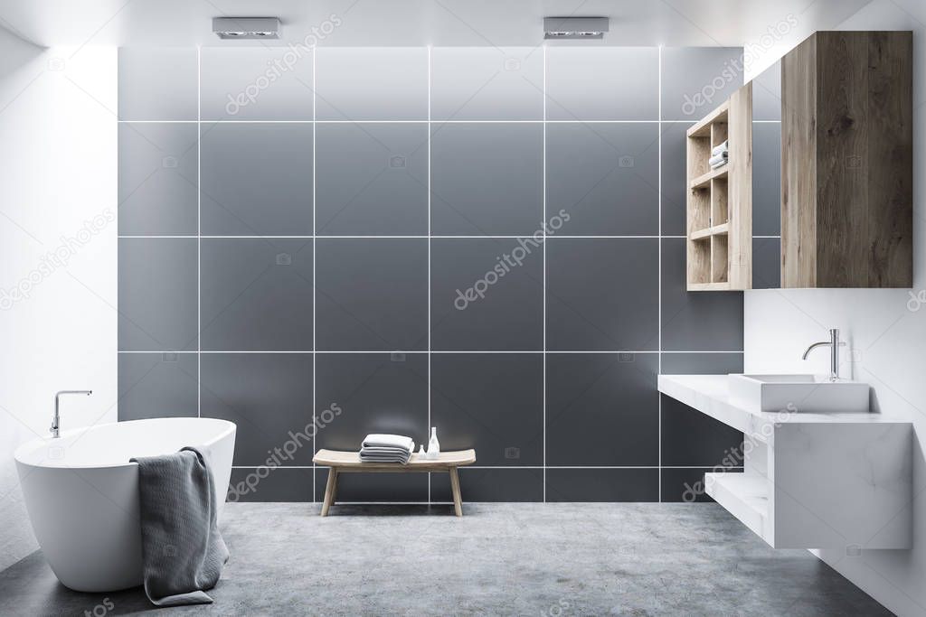 Black tile modern bathroom interior with wooden cabinets, a white tub and a sink. A concrete floor. 3d rendering mock up