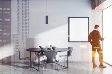 Bir beton zemin, yuvarlak masa ve sandalyeler gri beyaz yemek odası iç iş adamı. Dikey çerçeve poster duvara. 3D render sahte kadar çift tonlu görüntü pozlaması