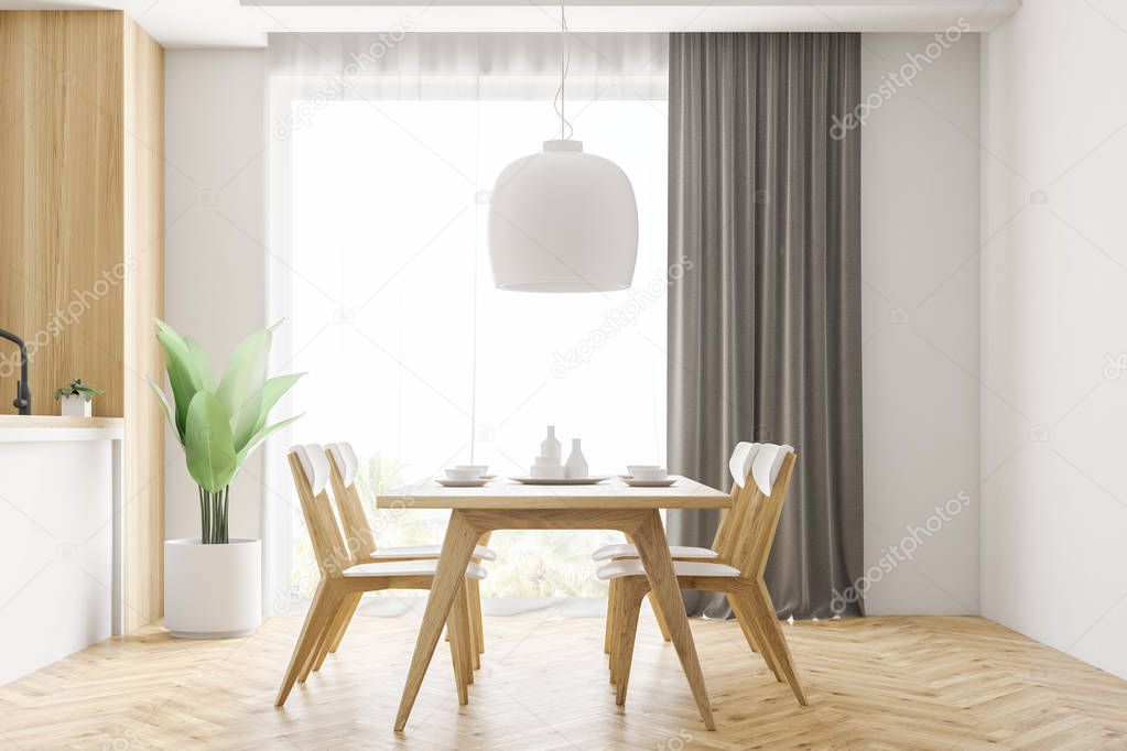 White and wooden kitchen interior with white cabinets, a wooden floor, a wooden table with chairs and a loft window. A side view. 3d rendering mock up
