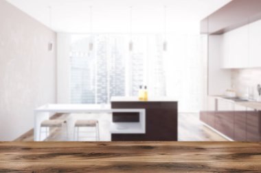 Kahverengi mutfak tezgahı bir beyaz bir ahşap zemin, bir masa sandalye ile ve panoramik bir pencere oda duvar. Modern ve rahat bir ev kavramı. 3d render alay kadar bulanık