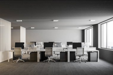 Beyaz ve gri planı ofis iç gri zemin, çatı windows ve bilgisayar tabloları satırları ile açın. 3D render alay