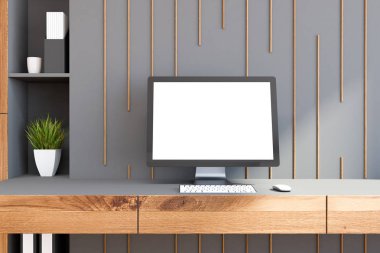 Bilgisayar ekran gri duvarlar ve bir kitaplık ile bir odada ahşap bir masa üzerinde duran sahte. 3D render alay