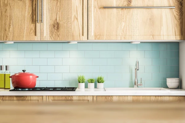 Mavi çini mutfak iç ahşap mutfak tezgahı ve dolapları ile bitkiler pot ve çeşitli pişirme kırmızı bir saksı. 3D render alay