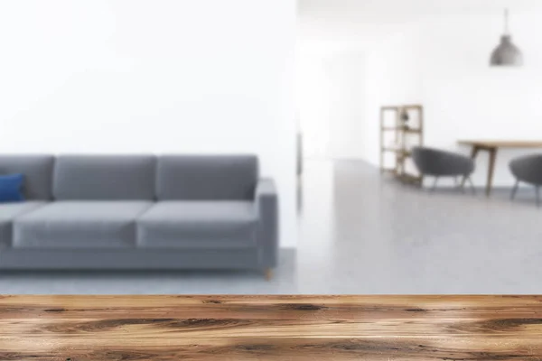白色客厅内部与灰色地板和一个长的舒适的沙发站在墙边 渲染模拟模糊 — 图库照片