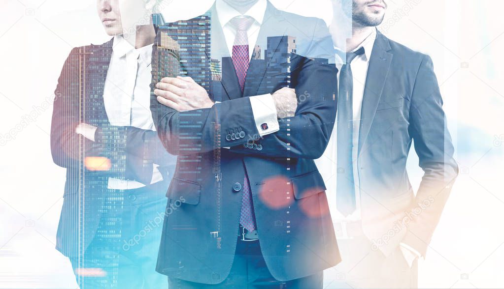 Unrecognizable business team members. A foggy city background. Concept of business cooperation. Toned image double exposure mock up.