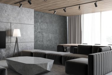 Beton çatı katında salon köşe gri bir zemin, bir koyu gri kanepe ve bir sehpa ile birlikte. 3D render alay