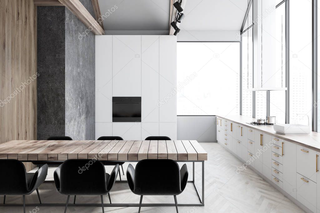 Loft kitchen interior with white, concrete and wooden walls, a wooden floor, white countertops with built in appliances and a wooden table with chairs. 3d rendering mock up