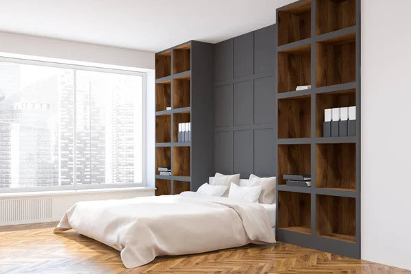 White and gray wall bedroom corner with a white bed standing between bookcases on a wooden floor. 3d rendering mock up