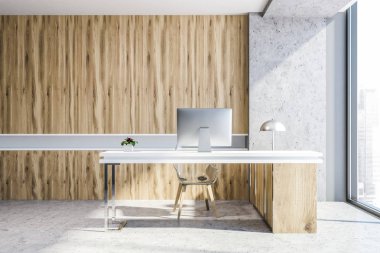 Ahşap ve beton ofis çalışma alanı ile bir beton zemin ve bilgisayar masası. Duvarın yanında çekmeceli ahşap bir dizi. 3D render alay