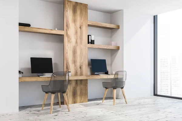 White wall home office or small business owner work space in a neat room with a concrete floor and two wooden computer desks. Shelves with folders. Side view 3d rendering