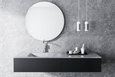 Şık bir gri lavabo ile beton banyo iç. Sabun ve şişe rafta. Yuvarlak bir ayna. 3D render sahte tonlu görüntü