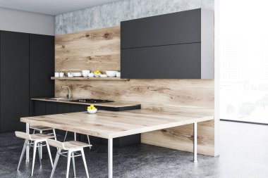 Bir beton zemin, siyah dolapları ve bir masa etrafında ayakta sandalye ile siyah ve ahşap mutfak iç. Yan görüntülemek 3d render sahte