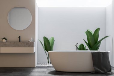 Bir büyük banyo iç beyaz duvarları, kiremitli bir zemin, yuvarlak ayna ile bir lavabo ve küvet ile önden görünümü. 3D render alay