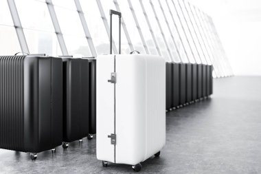 Siyah bavul Havaalanı beton zemin panoramik bir pencere yakınında duran satır. Bavul bir yana ayakta beyaz. Yan görünümü. 3D render alay