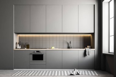 Beyaz duvarlar, beton zemin ve gri mutfak tezgahı ve dolaplar ile şık mutfak iç. 3D render alay