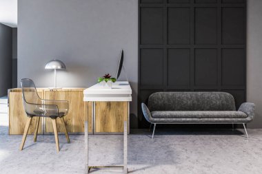 Bir modern İskandinav tarzı ev ofis bir dar bilgisayar masa ve şeffaf bir saç bir beton zemin üzerinde rahat gri kanepede duran. 3D render alay