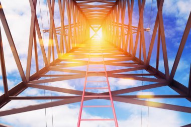 Red ladder inside a huge power line support as seen from the ground. Blue sky with clouds. and sun Concept of growth in business and life. 3d rendering mock up clipart