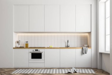 Beyaz duvarları, ahşap zemin ve beyaz mutfak tezgahı ve dolaplar ile şık mutfak iç. 3D render alay