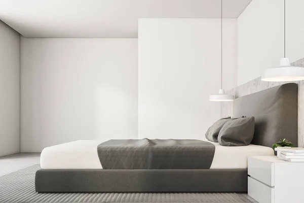 白い壁と北欧スタイルのベッドルーム コンクリートの床 カーペット ベッドサイド テーブルとマスター ベッドの側面図です レンダリングをモックアップします — ストック写真