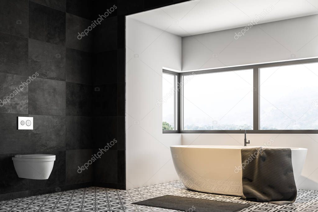 Bathroom interior with grey tile walls, a tiled floor, a bathtub under a large window, and a toilet. 3d rendering