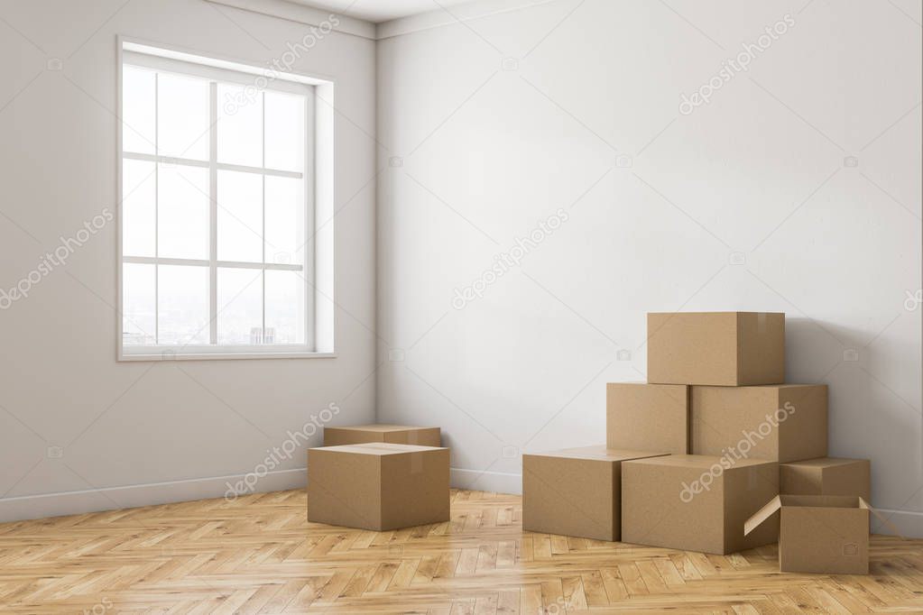 Empty white room corner with white walls, a wooden floor, a large window and stacks of closed cardboard boxes. Concept of moving in. 3d rendering mock up
