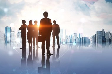 Siluetleri çeşitli iş takım üyelerinin bir şehir arka plan ve onun yansıması üzerinde duruyor. Parlayan bir ağ hologram ön. Tonlu görüntü pozlama sahte katlayın