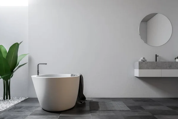 Large bathroom interior with white walls, a tiled floor, a sink with round mirror and a bathtub. 3d rendering mock up — Stock Image Large Bathroom Interior White Walls Tiled Floor Sink Mirror Bathtub Royalty Free Stock Images