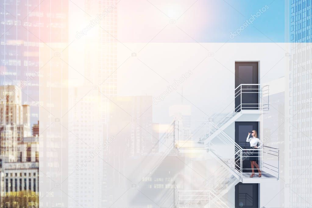 Modern building exterior with white walls, doors and emergency exit stairs with blonde businesswoman using binoculars. Blurred cityscape background. 3d rendering mock up toned image double exposure