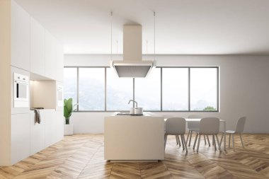 Beyaz duvarları, ahşap zemin, büyük pencereler, beyaz ada ve mutfak tezgahı ile modern mutfak ve yemek odası masa sandalye ile yan görünüm. 3D render alay