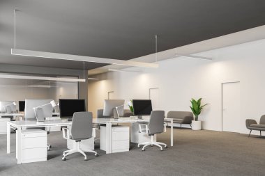 Modern gri ve beyaz ofis iç satır beyaz bilgisayar masaları ve çatı pencereleri ile. Gri halı kanepeler ve bitkiler ile. Kavram 3d render Kopyala yer başlamak