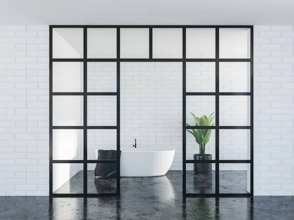 Modern bathroom interior with white brick walls, a black marble floor, a white bathtub with a black towel on it 3d rendering