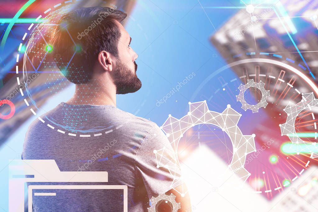 Rear view of young startup founder looking at cityscape. Cogwheels and hud foreground. Business planning and success concept. Toned image double exposure copy space