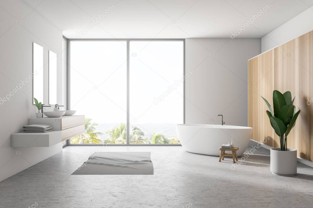 Stylish white bathroom interior with concrete floor, gray rug, window with tropical view, wooden wall, big bathtub, double sink with vertical mirrors and a potted plant. 3d rendering copy space