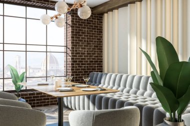 Tuğla duvarlar, ahşap zemin, gri rahat kanepe ve koltuklar ve ahşap masa ile birlikte modern kafeterya. Şık lambaları ve Avrupa cityscape penceresinden. 3D render kopya alanı
