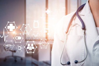 Tanınmayan genç doktor ve parlayan tıbbi simgeler ve sürükleyici arabirimi bulanık hastane arka plan üzerinde adam. Çift tonlu görüntü pozlaması