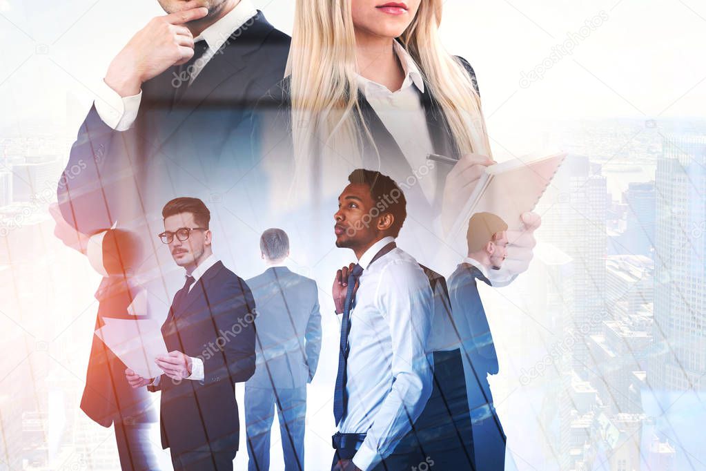 Members of diverse business team communicating in panoramic office. Large man and woman portraits foreground and cityscape. Teamwork and success concept. Toned image double exposure