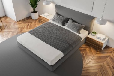 Üstten görünüm beyaz duvar minimalist yatak odası bir ahşap zemin ile bir gri halı ile masterbed ayakta ve gecelik ilişkiler. 3D render
