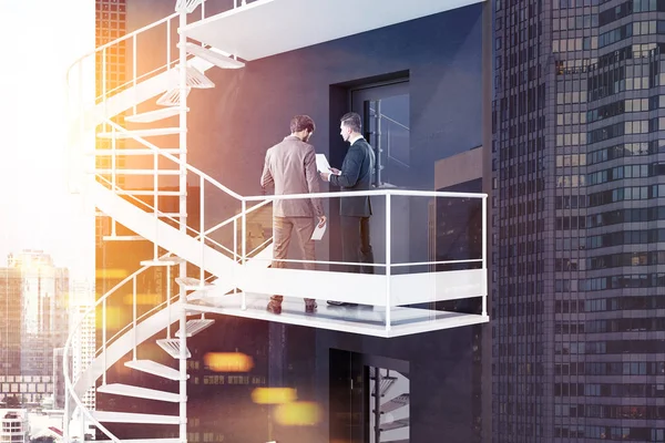 Two Business Partners Talking Standing White Emergency Stairs Black House — Stock Photo, Image