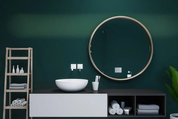 圆白色水槽站在黑色和白色的虚荣单位与一个圆形镜子上面 翡翠浴室配有盆栽设备和货架 — 图库照片