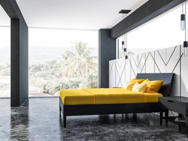 White geometric wall pattern bedroom interior with a concrete floor, a panoramic window with tropical view and yellow blanket masterbed. 3d rendering copy space