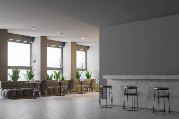 Gray bar corner with a concrete floor, small round tables and grey sofas and chairs. Retro lamps. Marble bar with round stools. 3d rendering copy space