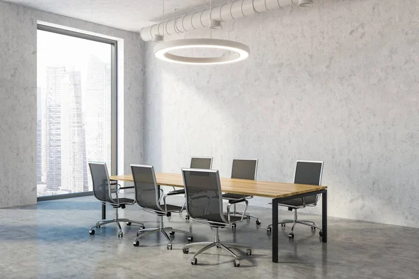 Industrial style conference room interior with concrete walls and floor, a wooden table and metal chairs. Round ceiling lamp and pipes. 3d rendering copy space
