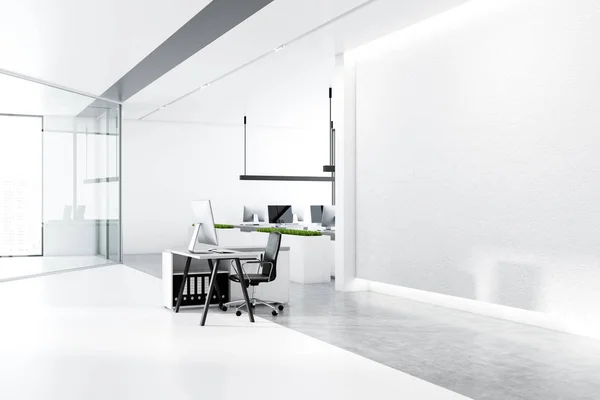 Minimalistic office interior with white walls, concrete floor with rows of white tables with black computer screens and panoramic windows. Side view of mock up wall and small desk. 3d rendering