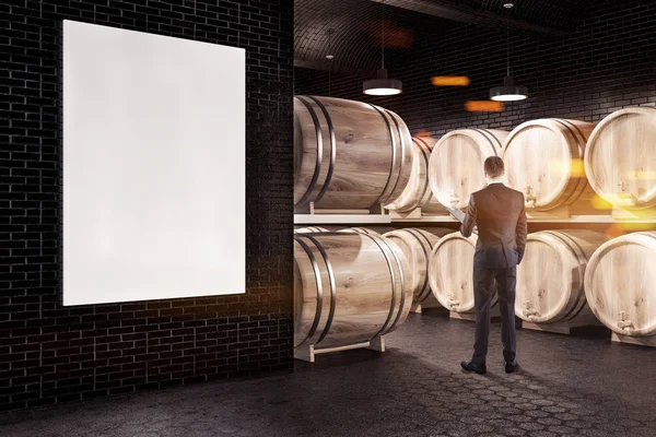 Rear View Businessman Standing Wine Cellar Black Brick Walls Hexagonal — Stock Photo, Image