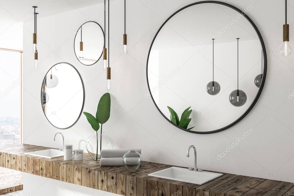 Double sink in wooden countertop in white bathroom interior with three round mirrors and panoramic window. Side view. 3d rendering