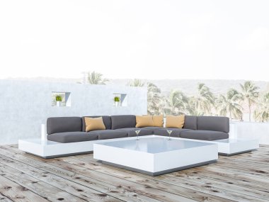 Tropikal görünüm balkon gri kanepeler ile yakın çekim