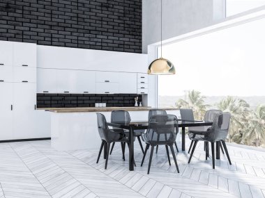 Şık çatı katı mutfak iç siyah tuğla duvarlar, Beyaz ahşap zemin, beyaz mutfak tezgahı ve şeffaf sandalye ile siyah tablo. 3D render