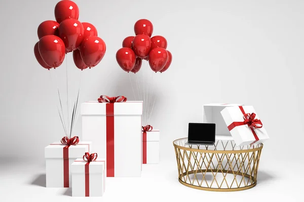 白色的礼物盒 红丝带和许多红色气球绑在白色的房间与笔记本电脑在咖啡桌上 — 图库照片